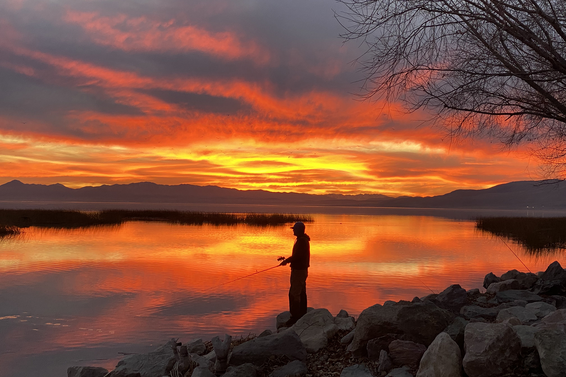 Fishing at sunset on a mountain lake in Wasatch County